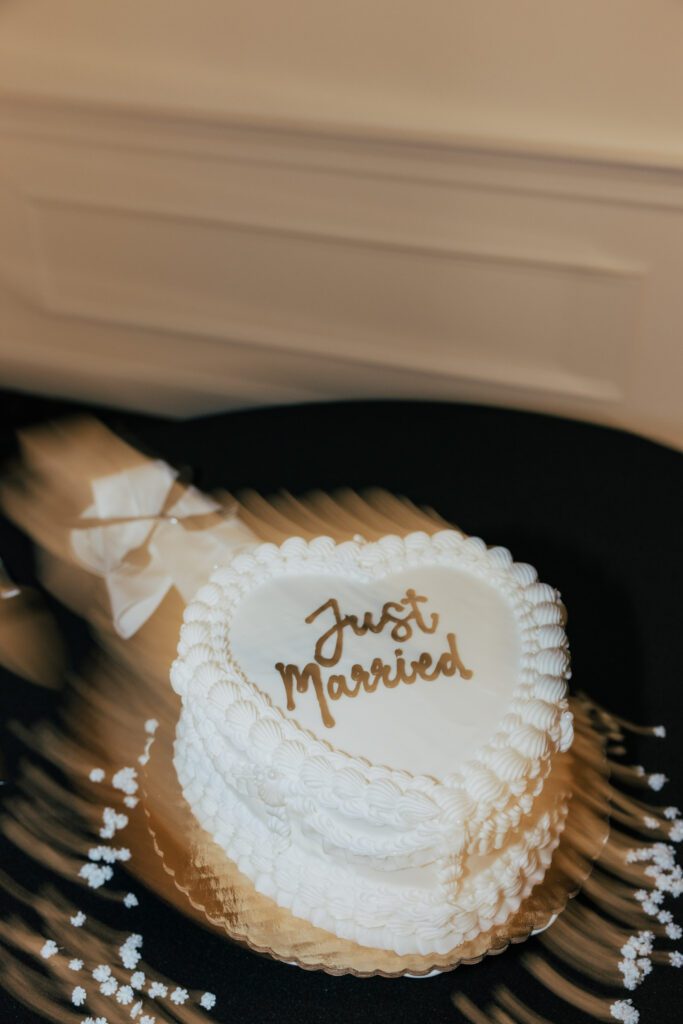 Just married heart shaped cake during classy wedding reception at Black Swan Country Club in Georgetown, Massachusetts.