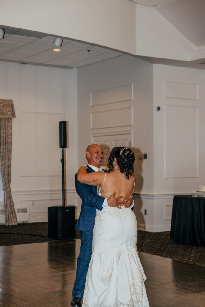 Father daughter dance during classy wedding reception at Black Swan Country Club in Georgetown, Massachusetts.