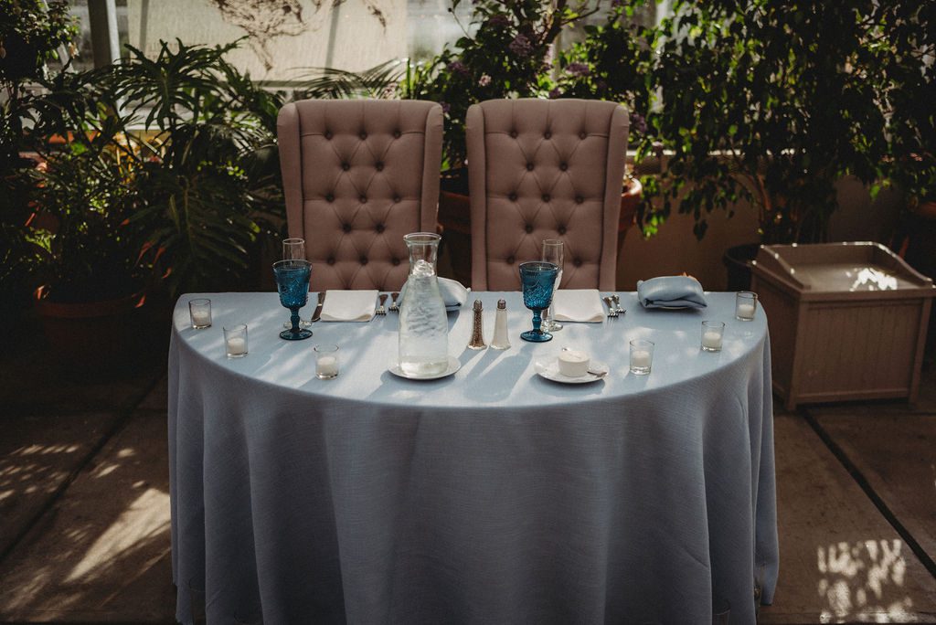 Bride and grooms table set up at Roger Williams Botanical Garden Park in Providence Rhode Island.