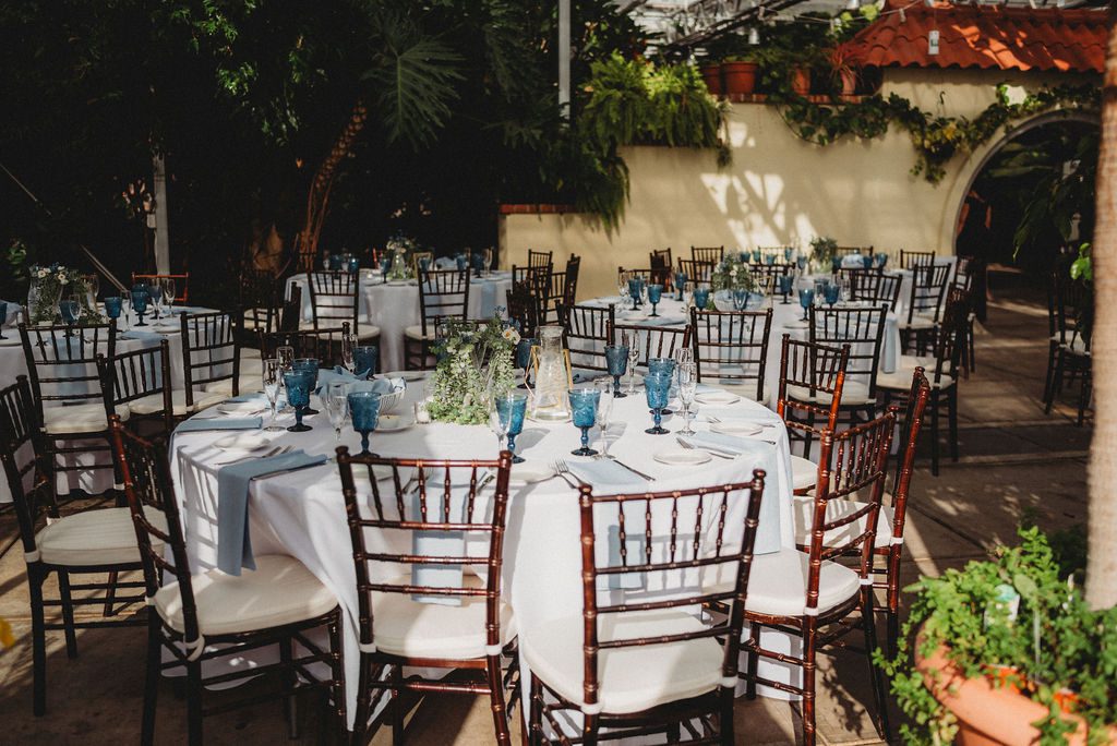 Close up of table set up for greenhouse wedding in in Roger Williams Botanical Garden Park in Providence Rhode Island.